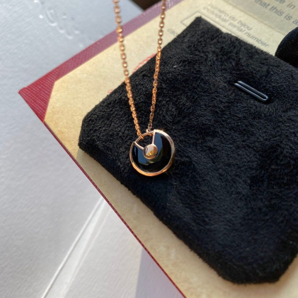 Ca*t*er  amulet necklace